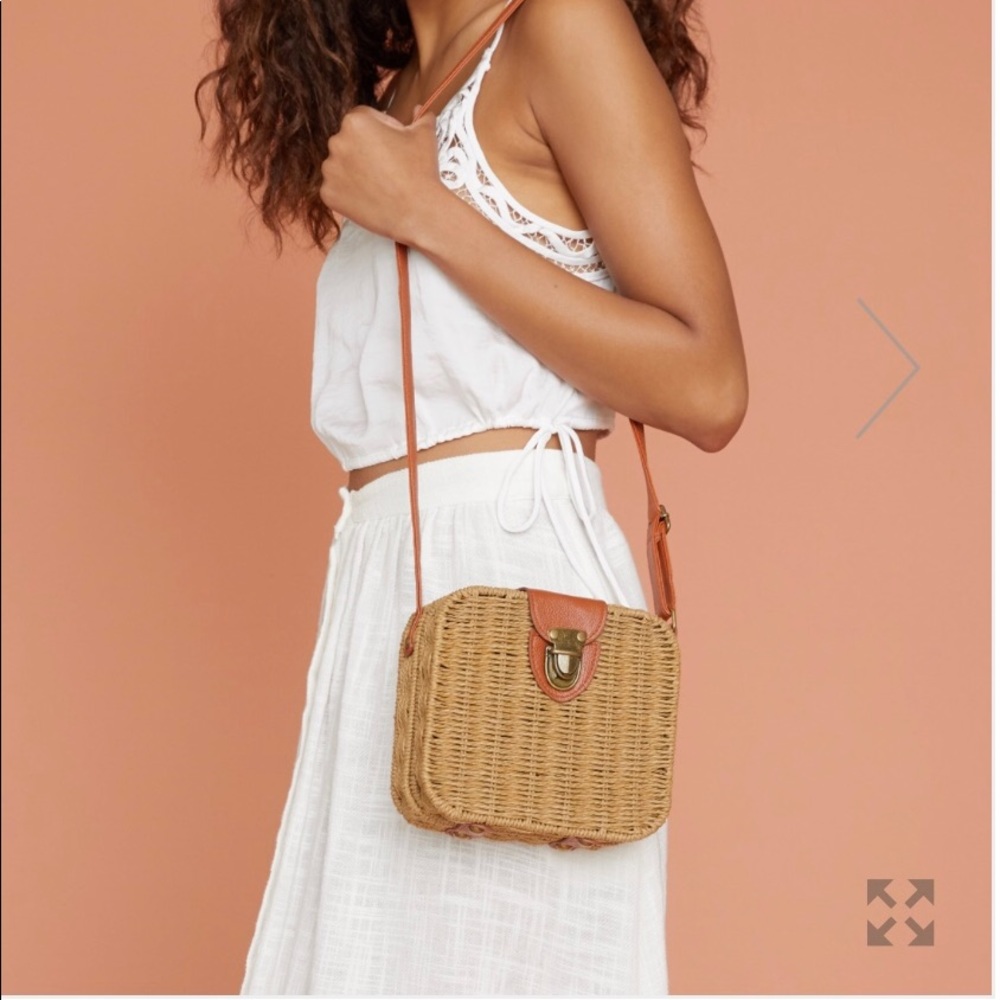 New and unopened Chic straw lined pocketbook